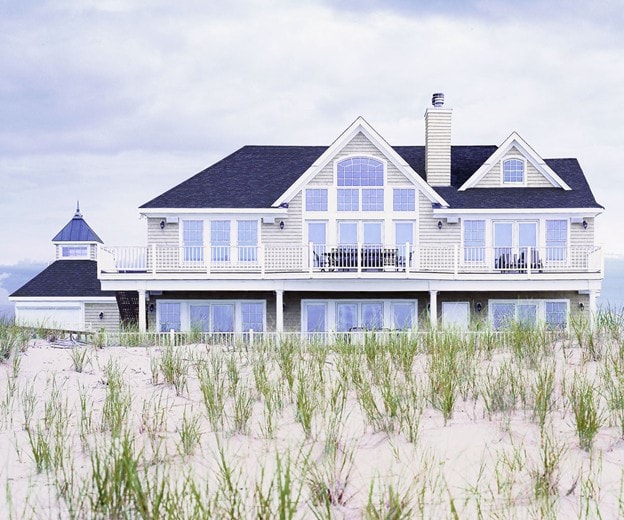 Coastal beach house with large Andersen windows