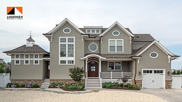 Andersen certified home exterior with shingle siding and custom windows